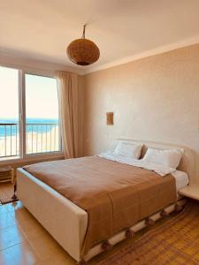 Postel nebo postele na pokoji v ubytování Amazigh Home