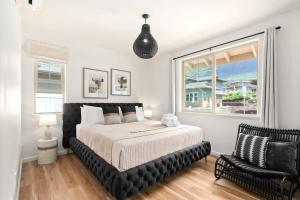 En eller flere senge i et værelse på Marbella Lane - Mesmerizing Ocean MT Views