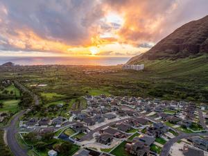 an aerial view of a city with a mountain at Marbella Lane - Elegant 3BR w Marvelous Views in Waianae
