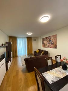 Una televisión o centro de entretenimiento en BW Residences - Belgrade Waterfront