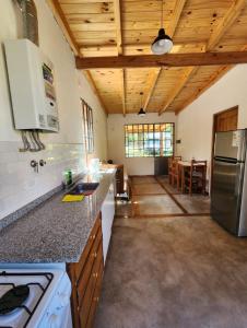 Køkken eller tekøkken på Cabañas Rincon del Champa