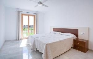 Giường trong phòng chung tại Sa Carrotja