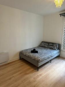 En eller flere senge i et værelse på Paris - Metro à 5 minutes grande terrasse