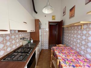 Una cocina o cocineta en Casa Giannella, a due passi dal mare 15 fotos más