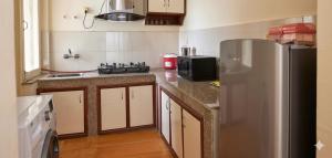 Kuchyň nebo kuchyňský kout v ubytování 1 Bedroom Penthouse