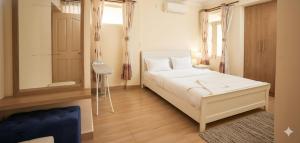 Postel nebo postele na pokoji v ubytování 1 Bedroom Penthouse