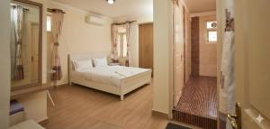 Postel nebo postele na pokoji v ubytování 1 Bedroom Penthouse