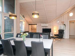 a conference room with a table and chairs at 5 star holiday home in Ansager in Ansager