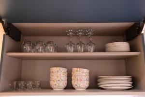 Nápoje v ubytování Appartement Georgio