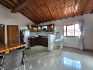 Kuchyň nebo kuchyňský kout v ubytování Apartamento céntrico en Guatapé - 2 habitaciones - 2 baños - Ideal familias