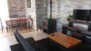 TV a/nebo společenská místnost v ubytování Ribera