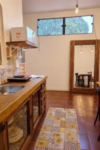 Køkken eller tekøkken på Studio a 4 min Centro, 5 min UFU e Hospital Sta Marta