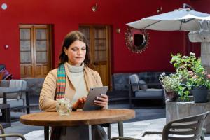 Et opholdsområde på Hotel Hacienda Sonqori Centro Histórico