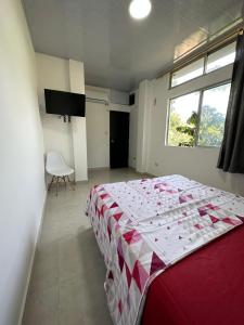 Giường trong phòng chung tại Arriendos Arauca +53 ảnh