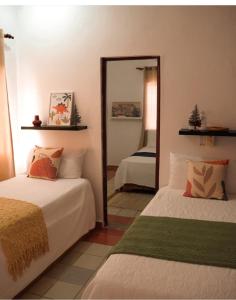 Giường trong phòng chung tại Hotel Montesilva +3 ảnh