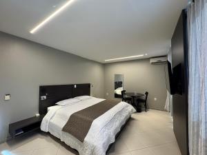 Postel nebo postele na pokoji v ubytování Luz Hotel Pato Branco