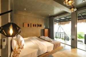 Postel nebo postele na pokoji v ubytování Sea View Clay House