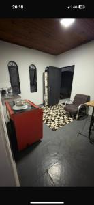 Et tv og/eller underholdning på Loft pousada Brandt 3