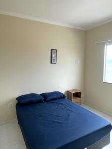 Postel nebo postele na pokoji v ubytování Ventos de Arubinha - Apto Inteiro - Reserva a partir de 04 dias em Janeiro e Fevereiro + 17 fotografií