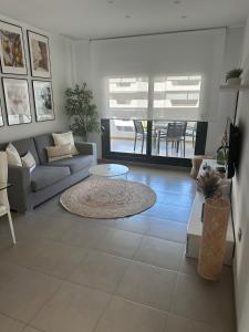 a living room with a couch and a table at Arenales SLB in Arenales del Sol