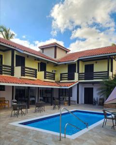 Bazén v ubytování Pousada Vitória Régia - Hotel Costeira nebo v jeho okolí