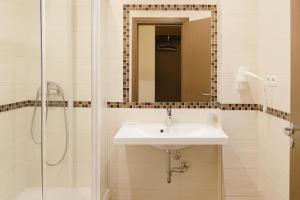 Ένα μπάνιο στο Vilnius City Room