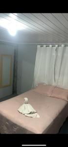 En eller flere senge i et værelse på Quartos House Family