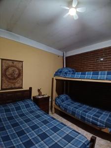 Ένα ή περισσότερα κρεβάτια σε δωμάτιο στο Ideal Little House