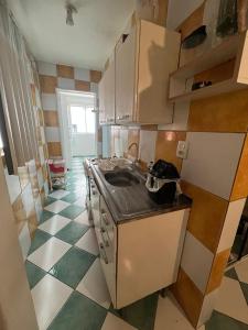 Kuchyň nebo kuchyňský kout v ubytování Ap central - Ed Pescador