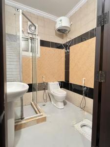 Koupelna v ubytování منازل الزائرين3 + 16 fotografií