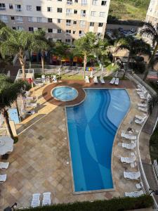 Swimmingpoolen hos eller tæt på Apartamento em Curitiba