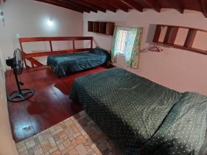 Ένα ή περισσότερα κρεβάτια σε δωμάτιο στο Miniduplex tipo Cabaña