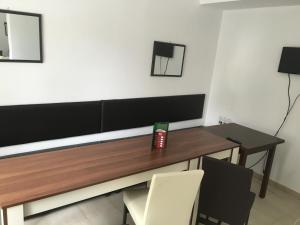 A television and/or entertainment centre at By The River Hotel