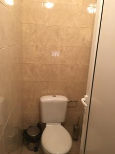 A bathroom at By The River Hotel
