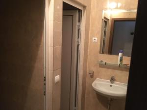 A bathroom at By The River Hotel