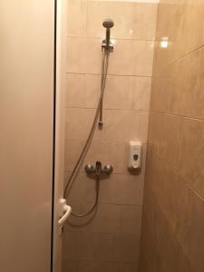 A bathroom at By The River Hotel