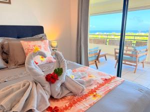 En eller flere senge i et værelse på Tahiti Moana Vista + 56 billeder