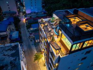 an overhead view of a building at night at Cat Ba Wistaria Hotel- Jacuzzi Rooftop & Fitness in Cat Ba