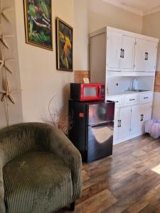 Kuchyň nebo kuchyňský kout v ubytování Cocoplum Rest N Hideaway #1