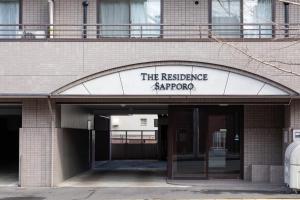 a building with a sign that reads the residence sapporo at The Residence Sapporo - すすきの駅から徒歩6分 - in Sapporo +60 photos