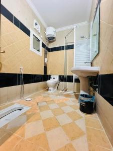 Koupelna v ubytování منازل الزائرين3