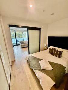 Postel nebo postele na pokoji v ubytování Central CBD - parking - sleeps 4