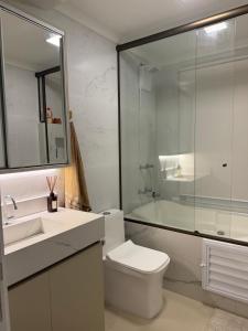 Phòng tắm tại Suíte Pé na Areia