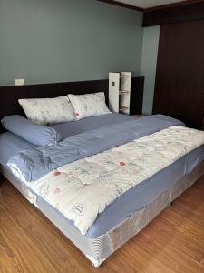 Ένα ή περισσότερα κρεβάτια σε δωμάτιο στο Milos House