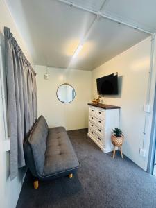 Et tv og/eller underholdning på Harbour Heights Cabins + 5 billeder