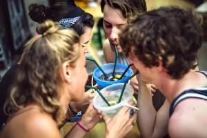 a group of people eating a bowl of food at zNAP - Khaosan Road สแนป ตรอกข้าวสาร in Bang Bua Thong Railway Station +25 photos