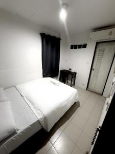 En eller flere senge i et værelse på zNap - Khaosan Bangkok