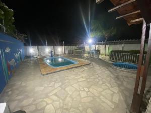 Swimmingpoolen hos eller tæt på SM Homestay - Casa Jacumã