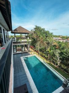 Swimmingpoolen hos eller tæt på Puri Sharai Homestay