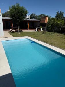 Swimmingpoolen hos eller tæt på Quincho El Aguaribay + 8 billeder